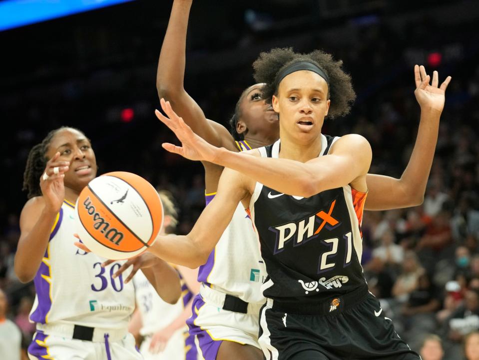 Jun 5, 2022; Phoenix, Ariz., U.S.; Phoenix Mercury forward Brianna Turner (21) passes the ball off against the Los Angeles Sparks during the second quarter at Footprint Center.