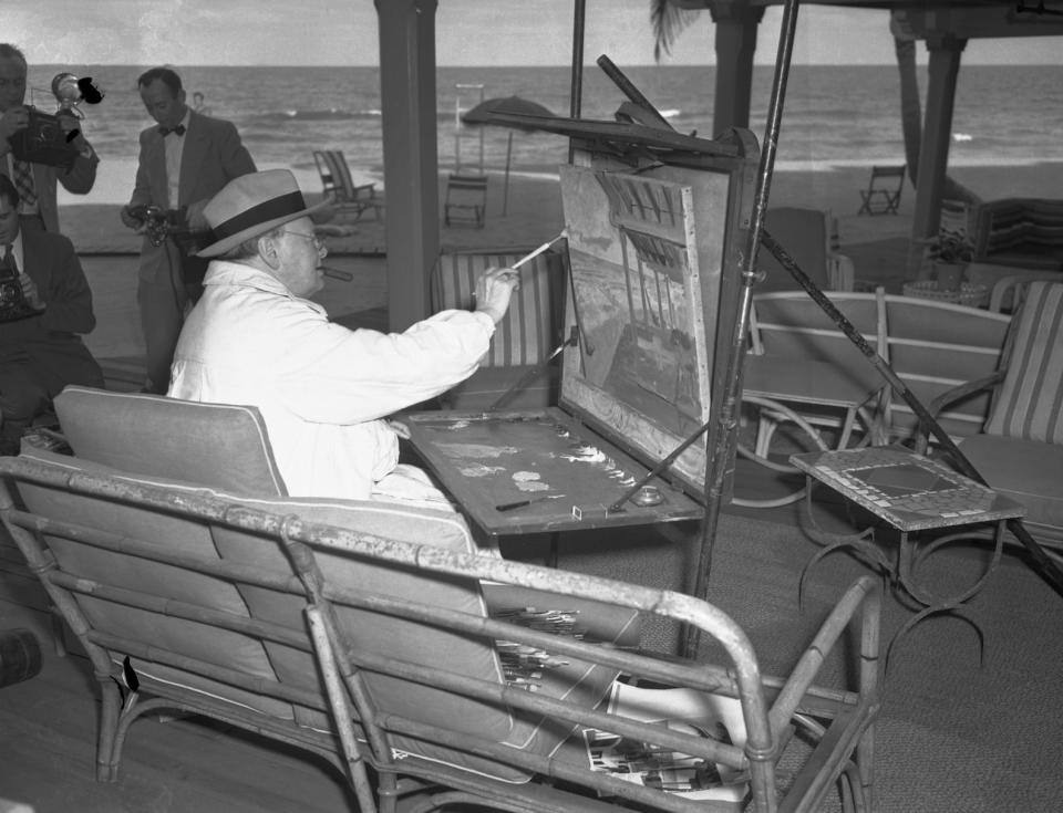 Celebrity guests at the original Surf Club included Sir Winston Churchill, seen here painting a scene from his beach cabana in 1946 - Credit: Bettmann/Getty