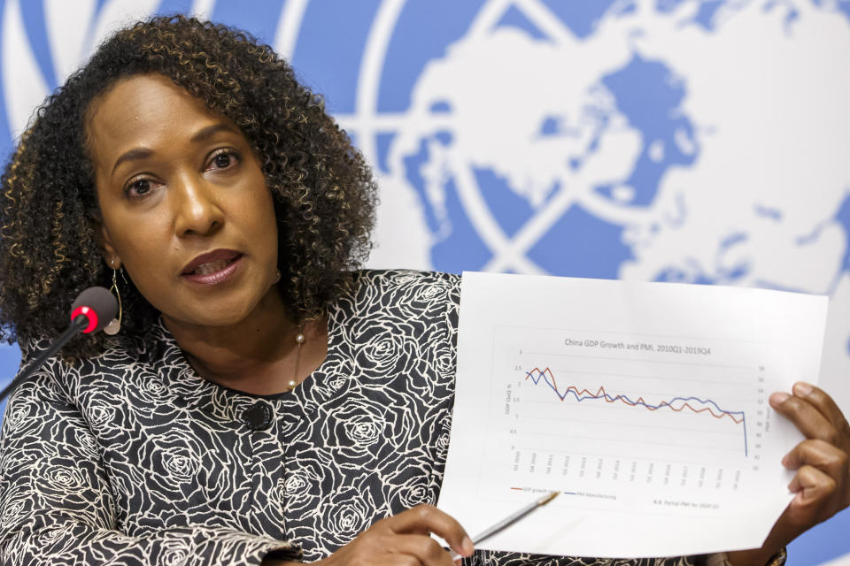 Pamela Coke-Hamilton, Director of the Division on International Trade and Commodities at the United Nations Conference on Trade and Development, UNCTAD, presents an UNCTAD's analysis on the impacts of new coronavirus COVID-19 on global value chains during a press conference at the European headquarters of the United Nations in Geneva, Switzerland, Wednesday, March 4, 2020. (Salvatore Di Nolfi/Keystone via AP)