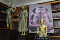 Some of the Cambodian antiquities recovered by the United States Attorney's Office are displayed during a news conference in New York, Monday, Aug. 8, 2022. Officials were announcing the repatriation of 30 antiquities to Cambodia that had been illegally trafficked. (AP Photo/Seth Wenig)