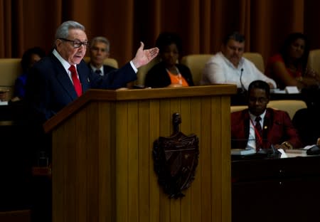 Cuban Communist Party leader Raul Castro addresses the audience during the enactment of the new constitution at the National Assembly, in Havana