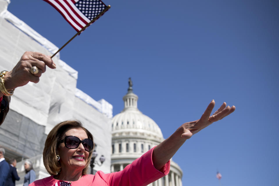 FILE - House Speaker Nancy Pelosi of Calif., waves following a news conference on the first 200 days of the 116th Congress at the House East Front steps of the Capitol building, in Washington, July 25, 2019. (AP Photo/Andrew Harnik, File)