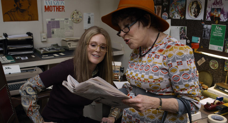 This image released by LD Entertainment and Roadside Attractions shows Julianne Moore as Gloria Steinem, left, and Bette Midler as Bella Abzug in a scene from "The Glorias." (LD Entertainment and Roadside Attractions via AP)