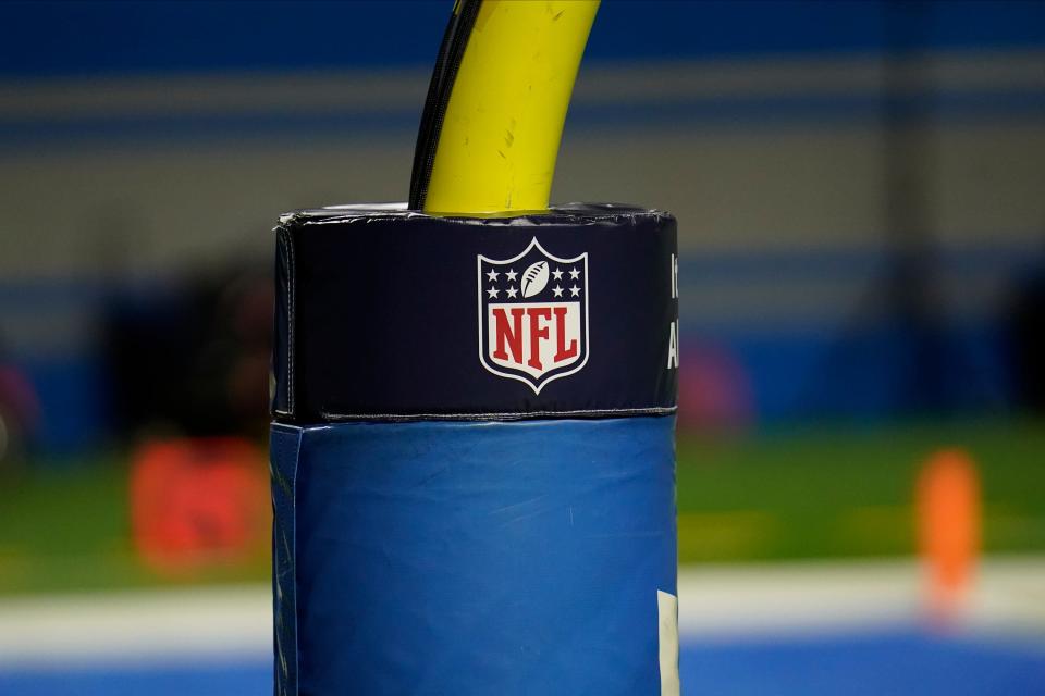 An NFL logo is shown on the goal post during the first half of an NFL football game between the Detroit Lions and Houston Texans, Thursday, Nov. 26, 2020, in Detroit.