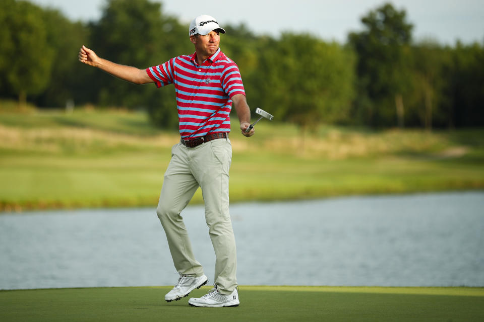 Jim Herman celebrates after winning the PGA Barbasol Championship gold tournament at Keene Trace Golf Club's Champions Course in Nicholasville, Ky., Sunday, July 21, 2019. (Alex Slitz/Lexington Herald-Leader via AP)