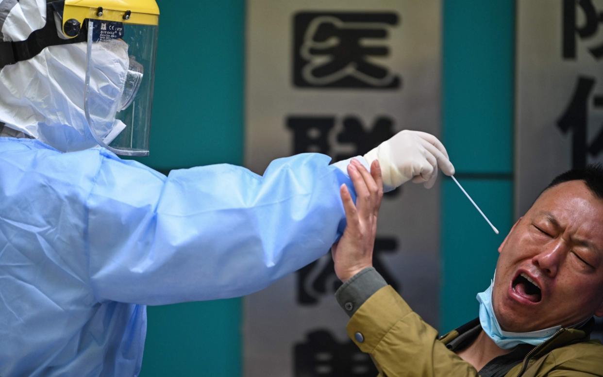 Testing for the virus is continuing in Wuhan, where it is believed to have broken out - Hector Retamal/Getty Images