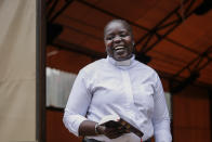 Associate Pastor Caroline Omolo stands for a portrait at the Cosmopolitan Affirming Community church, which serves a predominantly LGBTQ congregation, in Nairobi, Kenya, on Monday, Oct. 11, 2021. She says some faculty and students at Kenya's theological schools support her church, which has about 300 members. (AP Photo/Brian Inganga)