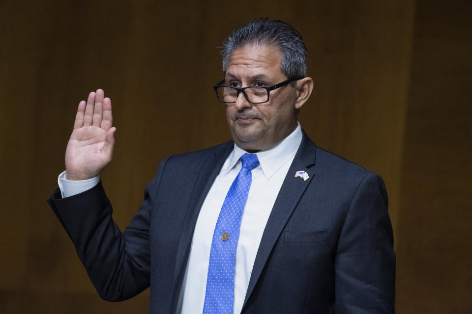 FILE - Michael Carvajal, director of the Federal Bureau of Prisons, is sworn in during a Senate Judiciary Committee hearing on June 2, 2020. Carvajal, the outgoing director of the Bureau of Prisons, has been subpoenaed to testify before a Senate committee examining abuse and corruption in the beleaguered federal agency. (Tom Williams/CQ Roll Call/Pool via AP, File)