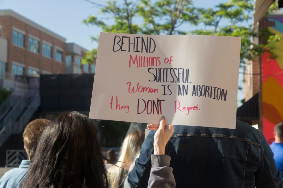 St. George community members gather downtown in defense of Roe v. Wade Thursday, May 5, 2022.