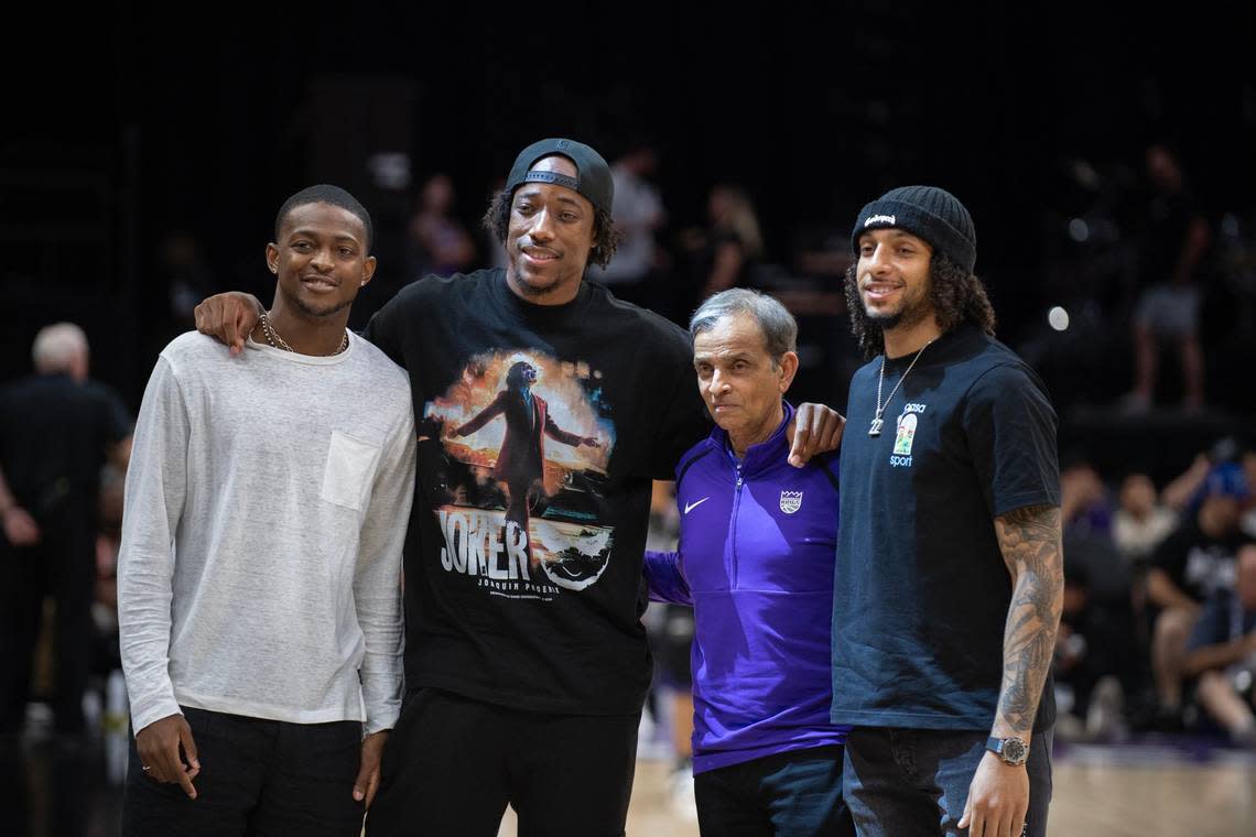 New Sacramento Kings player DeMar DeRozan stands with De’Aaron Fox, left, Kings co-owner Vivek Ranadivé, and 2024 draft pick Devin Carter, right, during the California Classic summer league contest against the Chinese men’s team on Saturday, July 6, 2024 at Golden 1 Center.