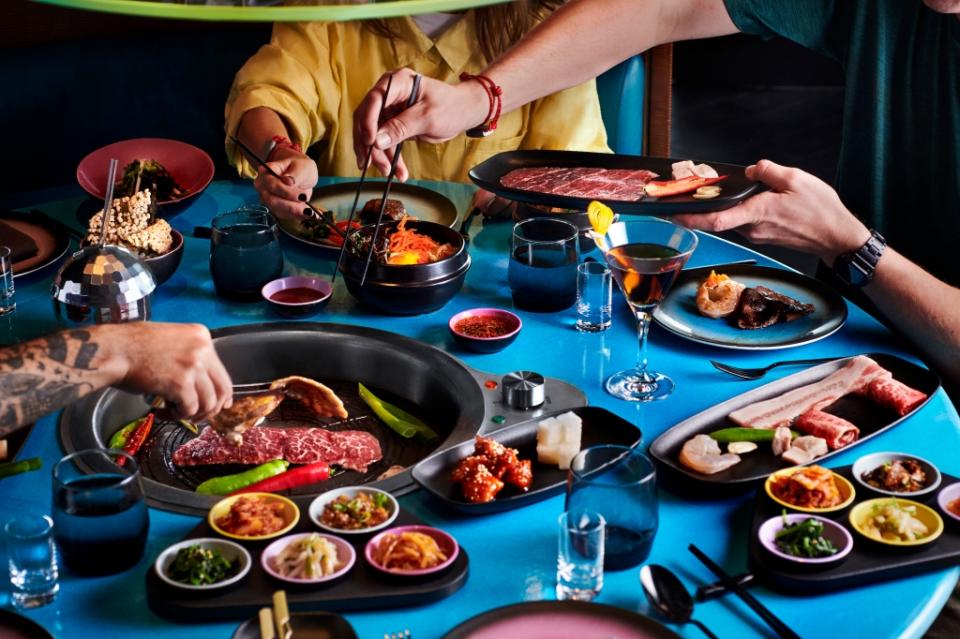 Closeup of the table while a group of people grill and eat at Gunbae. UK Photoshoot / Atlantis Shoot Dates: Sept 27-30, 2021 Usage: Full Buyout Goal: Food & Beverages Deliverables: Retouched images, gifs, and videos TEAM Photographer: Scott Grummett https://www.scottgrummett.com Agent: Terri Manduca Food Stylist / AD: Elisa Merlo CD: Christian Schrader Art Buyer / Producer: Kathy Boos