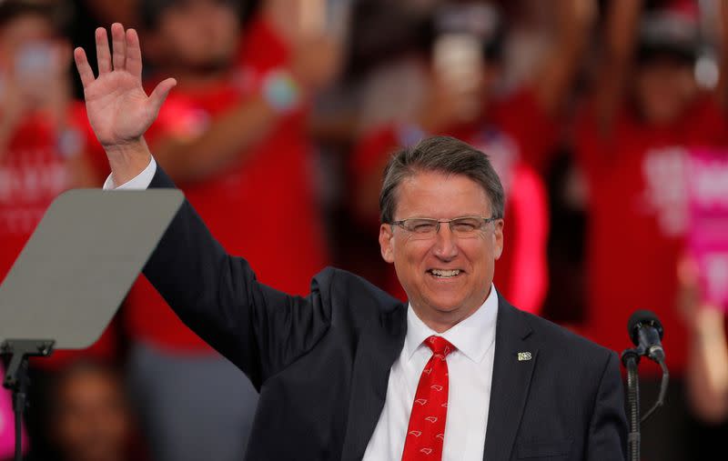 FILE PHOTO: North Carolina Governor Pat McCrory waves before speaking ahead of Republican presidential nominee Donald Trump at a campaign rally in Raleigh