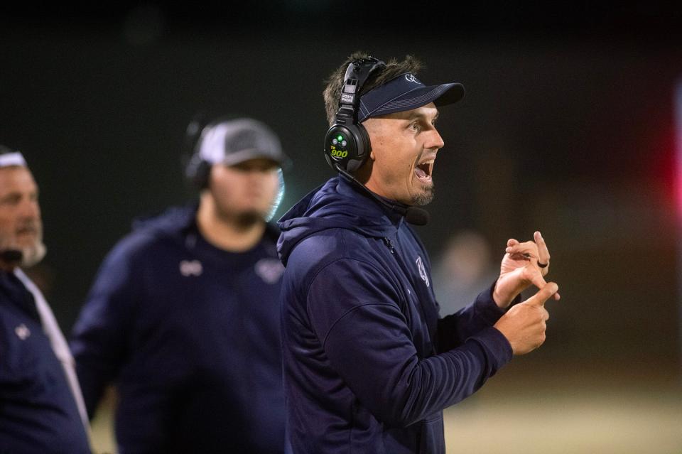 Greene County head coach Michael KIng gives direction to his team during play against Raymond High Nov. 3 , 2023, in Raymond, Miss., in the first-round MHSAA 4A playoffs.