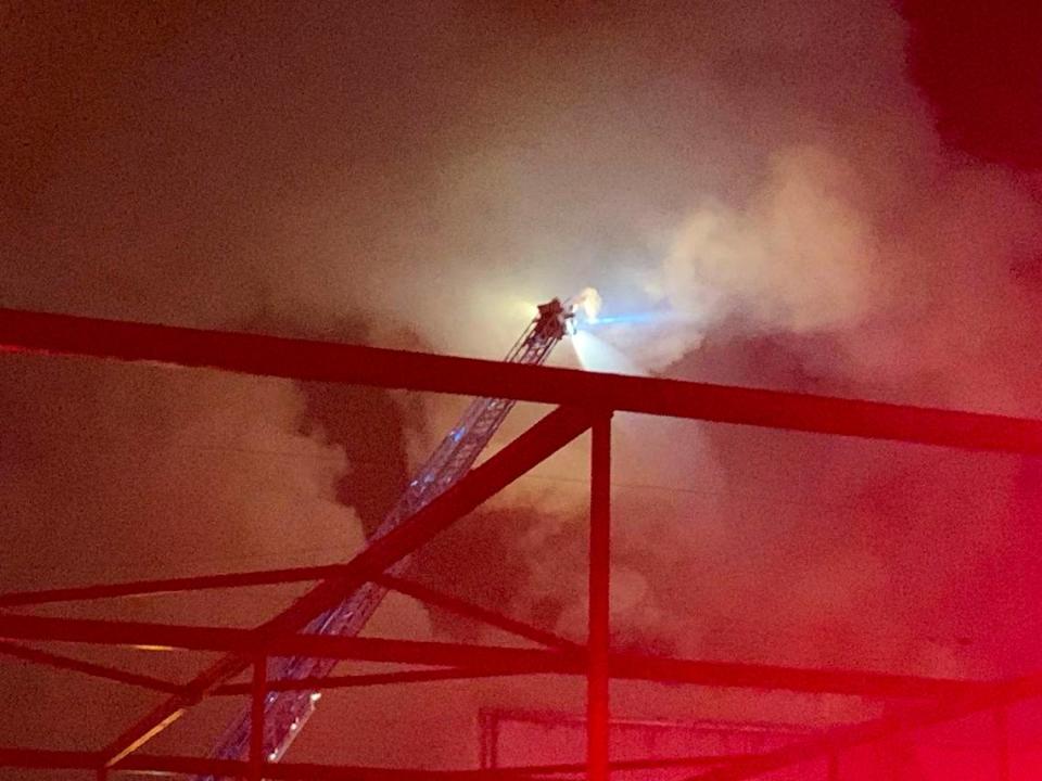 Crews fought a fire inside a large industrial building in Fresno south of downtown on Wednesday, Nov. 8, 2022, according to Fresno Fire Department. FRESNO FIRE DEPARTMENT