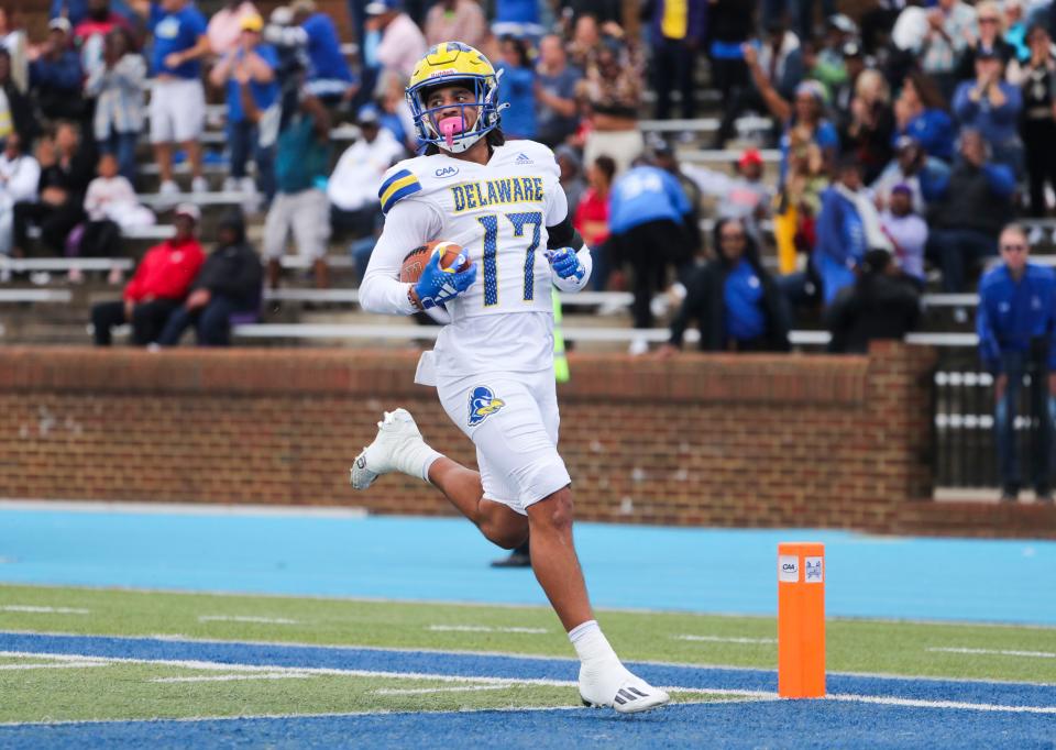 Delaware punt returner Jourdan Townsend slips into the end zone on his return for a touchdown in the first quarter at Armstrong Stadium in Hampton, Va., Saturday, Oct. 21, 2023.