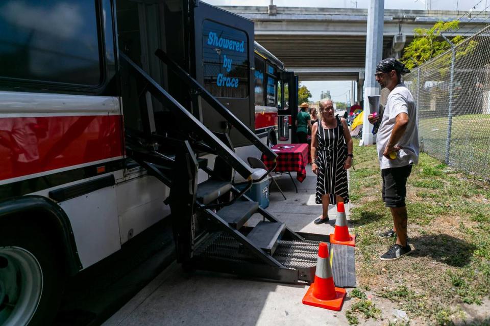 Community volunteers worked together to provide COVID-19 tests to the homeless in Miami’s Overtown neighborhood on Friday, March 27, 2020. Food, hand sanitizer, clothing and a mobile shower was also provided to them.