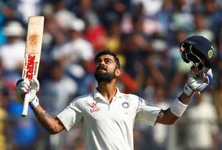 Cricket - India v England - Fourth Test cricket match - Wankhede Stadium, Mumbai, India - 11/12/16. India's Virat Kohli celebrates his double century. REUTERS/Danish Siddiqui