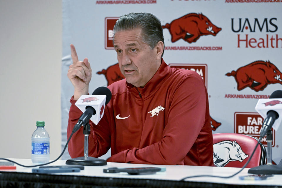 John Calipari answers questions from reporters after being introduced as Arkansas men's basketball coach Wednesday, April 10, 2024, in Fayetteville, Ark. (AP Photo/Michael Woods)