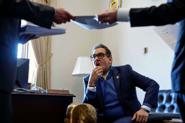 PHOTO: FILE - U.S. Representative George Santos assigns legislative aides to read a bill by one of his colleagues, for him to decide whether to join as a co-sponsor, in his Capitol Hill office in Washington, D.C., Feb, 28, 2023. (Jonathan Ernst/Reuters, FILE)