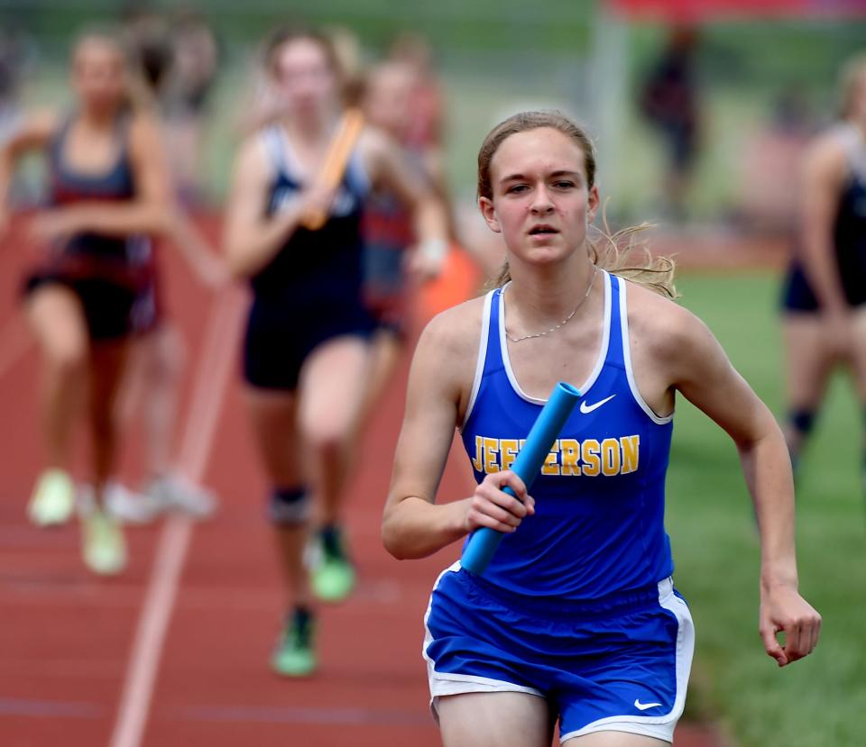 Kim Miller of Jefferson takes off to lead the 4x800 meter relay as Miller, Veronica Fitzgerald, Alyssa Masserant and Jenna Pilachowski won the D2 Regional 4x800 race at Milan Friday, May 20, 2022.