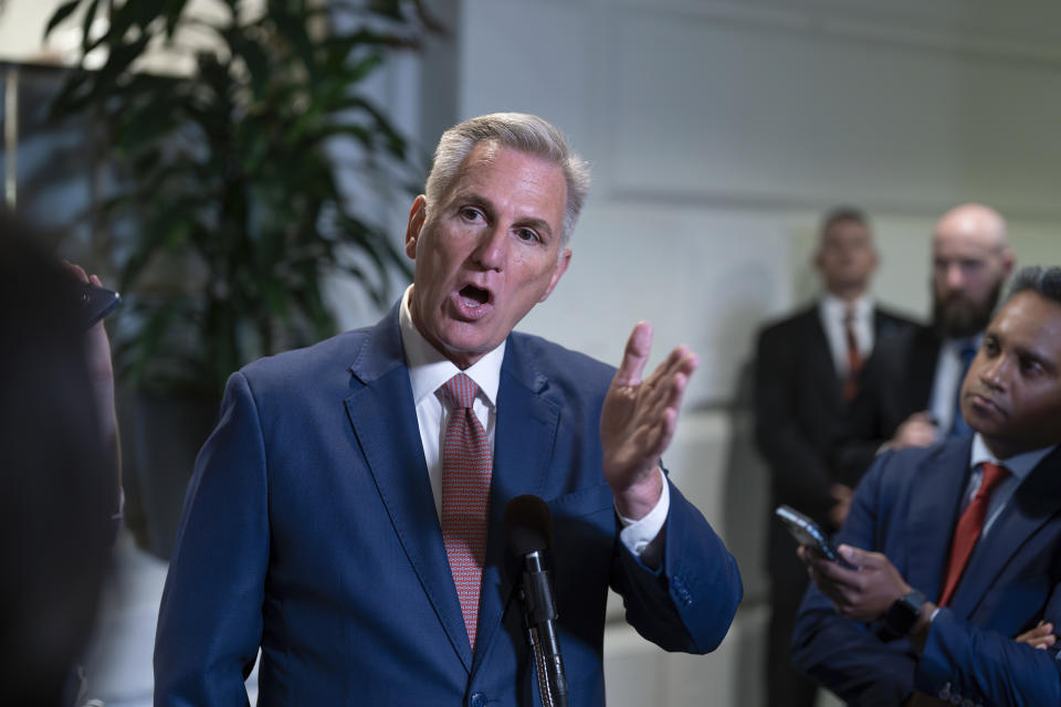 Speaker of the House Kevin McCarthy, R-Calif., talks to reporters about avoiding a government shutdown and launching an impeachment inquiry into President Joe Biden, following a closed-door meeting with fellow Republicans at the Capitol in Washington, Thursday, Sept. 14, 2023. (AP Photo/J. Scott Applewhite)