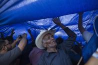 <p>Supporters of Honduran President Juan Orlando Hernandez, who is running for reelection, march to show support for their candidate in Tegucigalpa, Honduras, Tuesday, Nov. 28, 2017. (Photo: Rodrigo Abd/AP) </p>