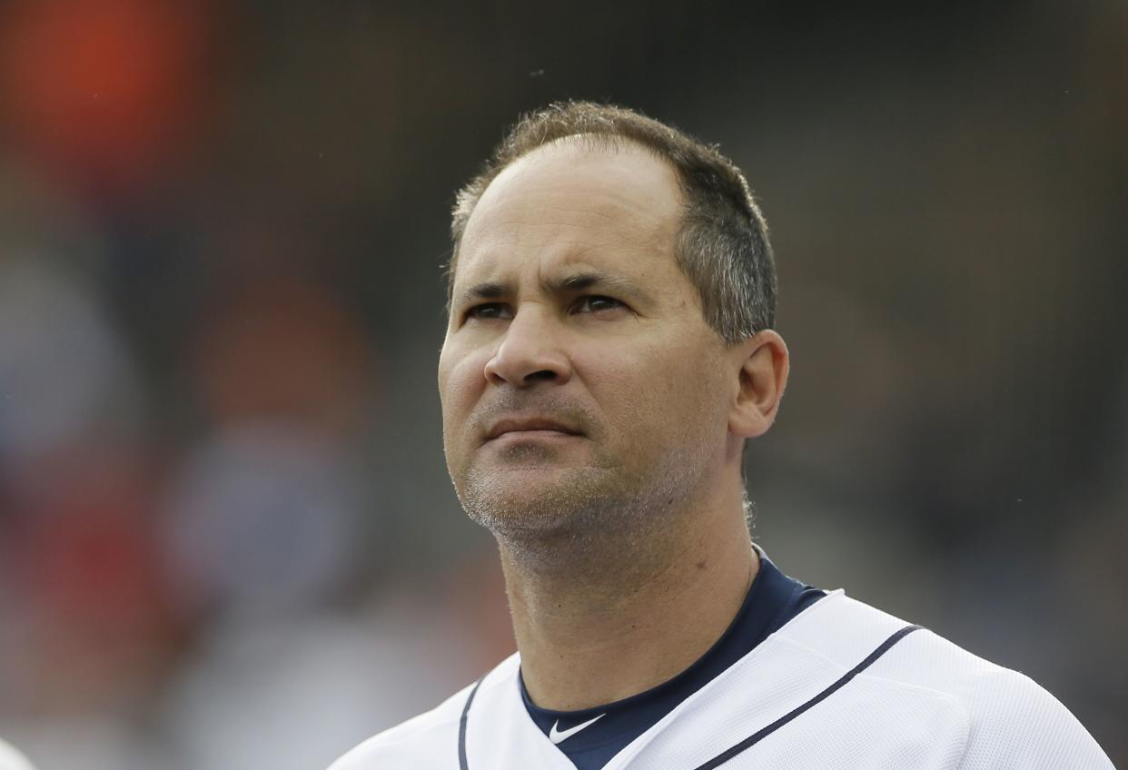 Detroit Tigers first base coach Omar Vizquel is seen in the dugout  before the first inning of a game on June 2, 2015, in Detroit. 