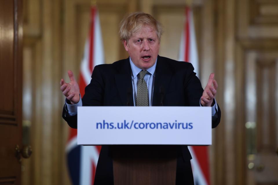 Britain's Prime Minister Boris Johnson addresses a news conference to give a daily update on the government's response to the novel coronavirus COVID-19 outbreak, inside 10 Downing Street in London on March 18, 2020. (Photo by Eddie MULHOLLAND / POOL / AFP) (Photo by EDDIE MULHOLLAND/POOL/AFP via Getty Images)