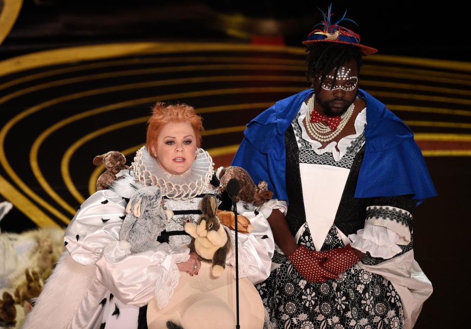 Melissa McCarthy, left, and Brian Tyree Henry present the award for best costume design at the Oscars on Feb. 24, 2019.