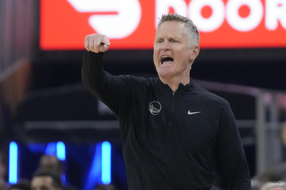 Golden State Warriors head coach Steve Kerr gestures toward players during the first half of Game 4 in the first round of the NBA basketball playoffs against the Sacramento Kings in San Francisco, Sunday, April 23, 2023. (AP Photo/Jeff Chiu)