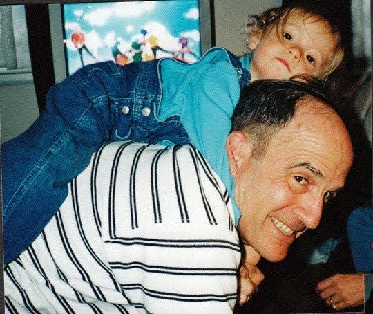 Bobby Sanders with his granddaughter Lizzie in 2001.