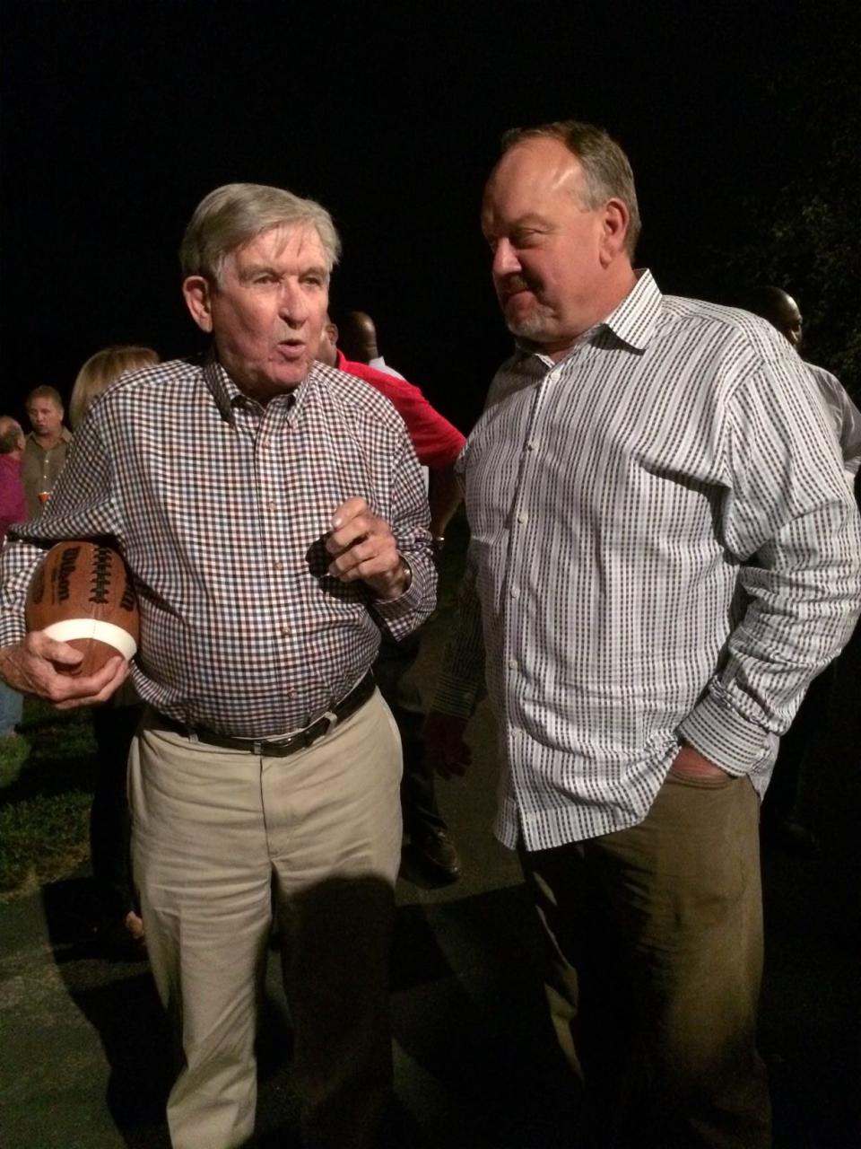 Johnny Majors, left, talks with Glenn Streno during a gathering in Knoxville in September 2016.