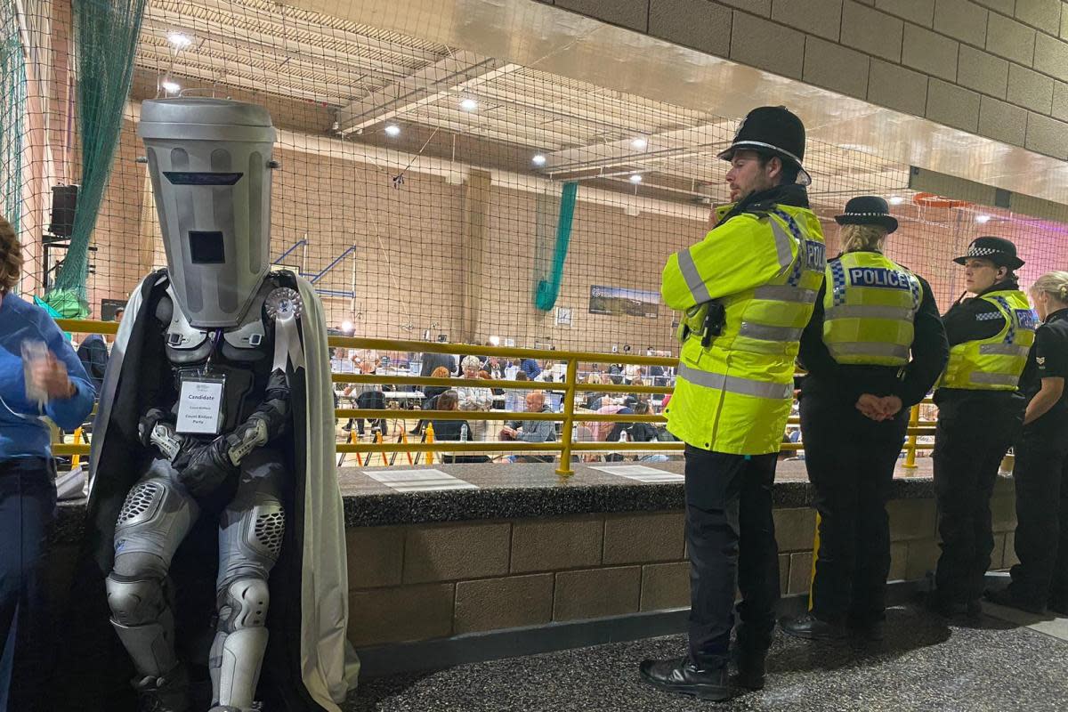 Count Binface beside police officers at the Richmond and Northallerton constituency count <i>(Image: LDRS)</i>