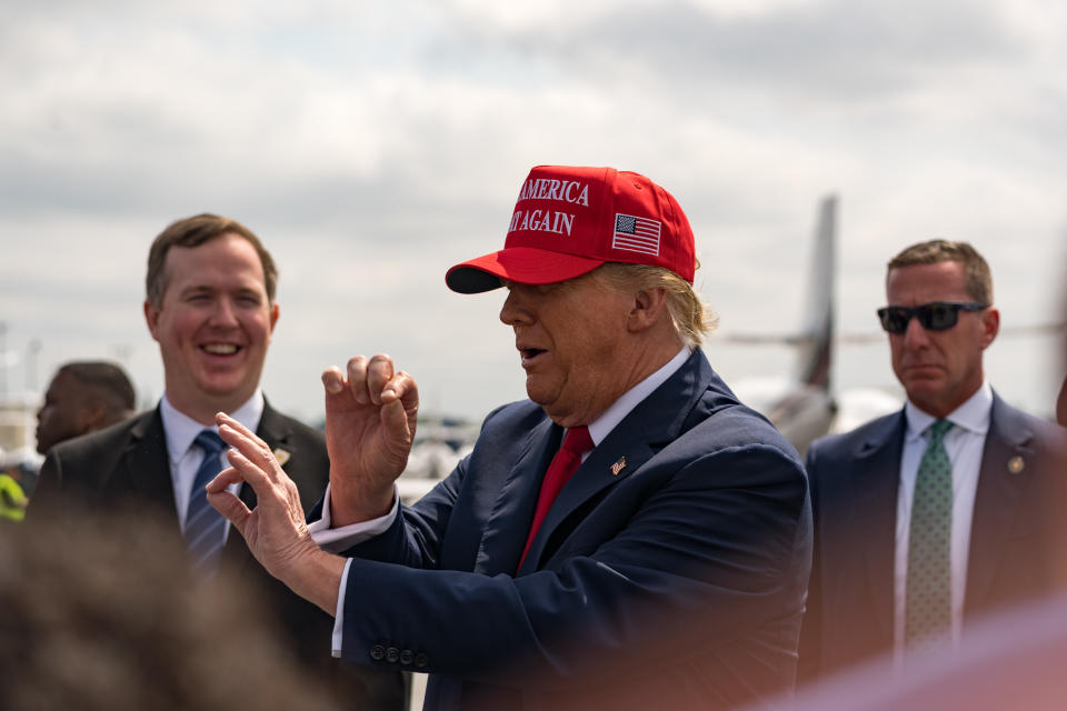 ATLANTA, GA - APRIL 10: Former President Donald Trump speaks to the media upon arriving at Atlanta Airport on April 10, 2024 in Atlanta, Georgia. President Trump is visiting Atlanta for a campaign fundraising event he is hosting.  (Photo by Megan Varner/Getty Images)