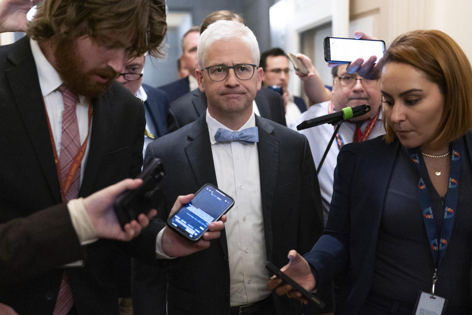 Rep. Patrick McHenry, R-N.C., the temporary leader of the House of Representatives and the speaker pro tempore, leaves the Republican caucus meeting at the Capitol in Washington, Thursday, Oct. 12, 2023. (AP Photo/Jose Luis Magana)