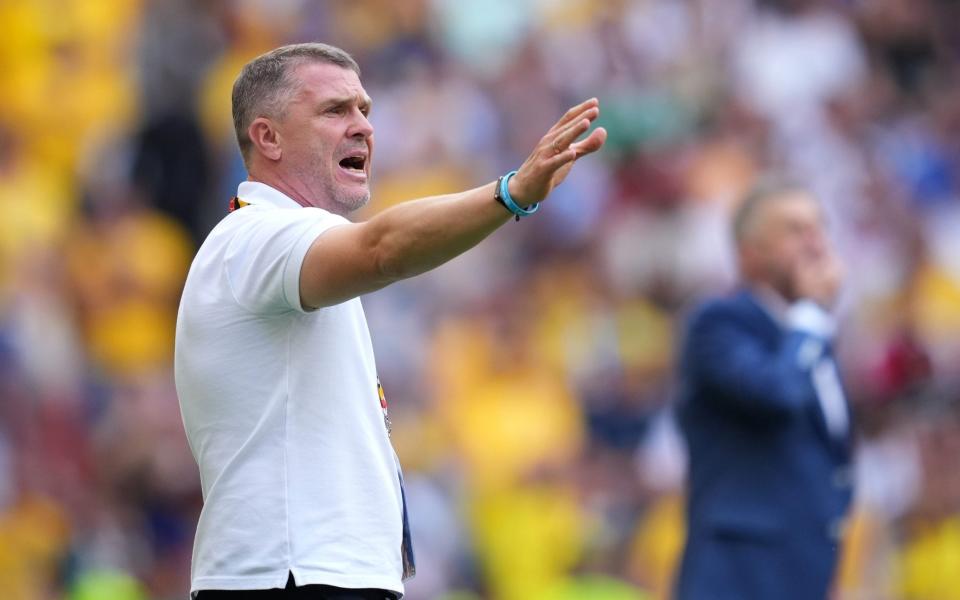 Serhiy Rebrov makes a gesture during Ukraine's Euro 2024 opener against Romania