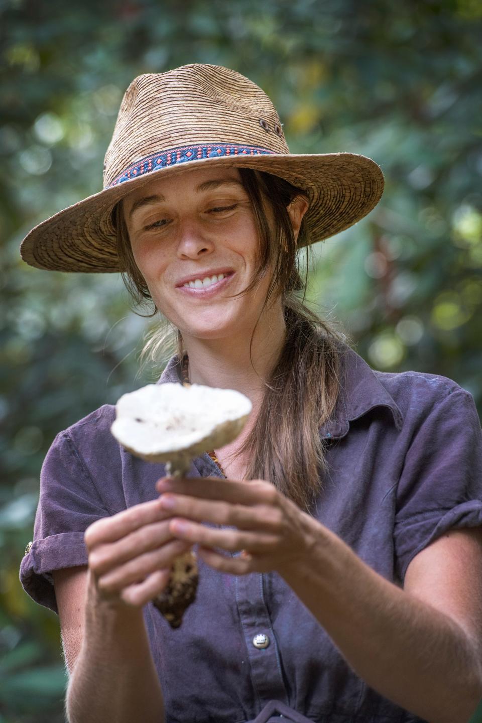 Kat Shaw describes the characteristics of a poisonous mushroom on a foraging tour in Black Mountain, September 14, 2023.