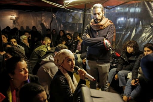 Young Lebanese discuss the protest-ridden country's political future in an impromptu debating chamber set up in a tent in second city Tripoli