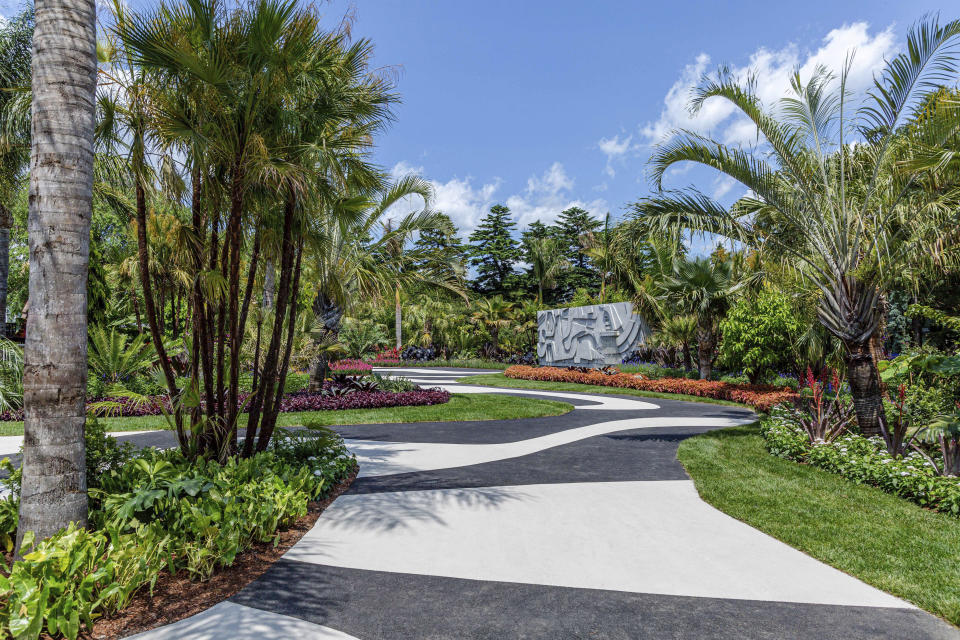 This undated photo provided by The New York Botanical Garden shows the Modernist Garden's strikingly patterned paths that lead through extensive curvilinear planting beds to an open plaza with a large pool framed by a wall carved in relief and is part of the exhibit "Brazilian Modern: The Living Art of Roberto Burle Marx" at NYBG in New York. In what NYBG has dubbed its largest botanical exhibition ever, the exhibit celebrates the Brazilian modern artist, landscape architect and conservationist. (The New York Botanical Garden via AP)