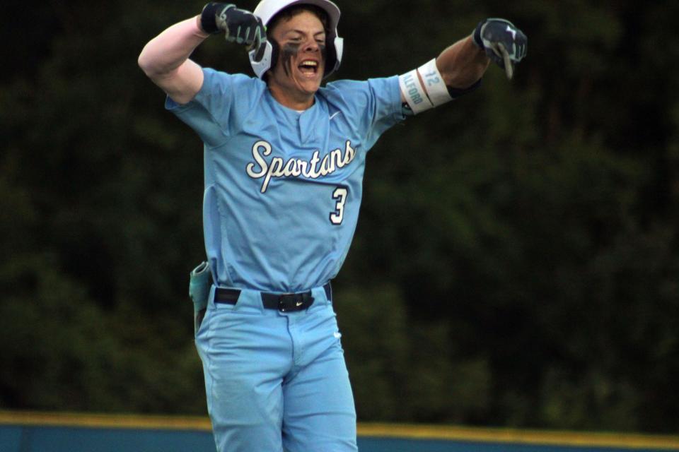 St. Johns Country Day's Seth Alford (3) celebrates while approaching the plate after his grand slam against Trinity Christian on Monday.