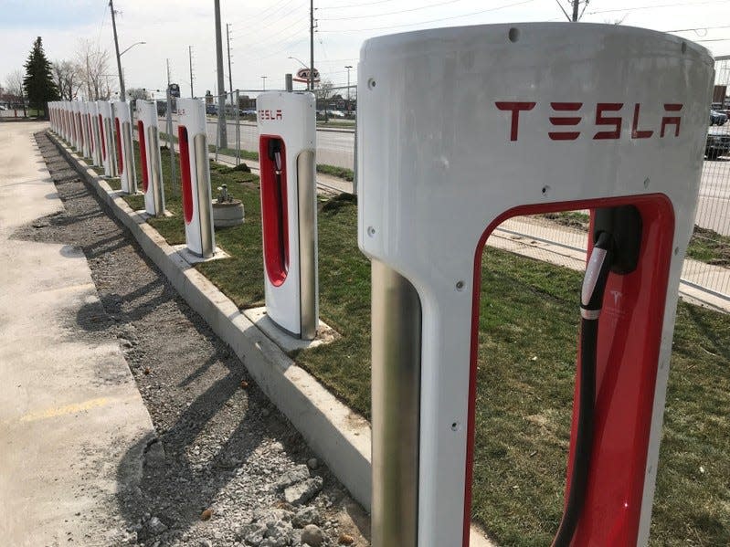 FILE PHOTO: Tesla superchargers are installed at the Quinte Mall in Belleville, Ontario, Canada, May 6, 2018. REUTERS/David Lucas/File Photo