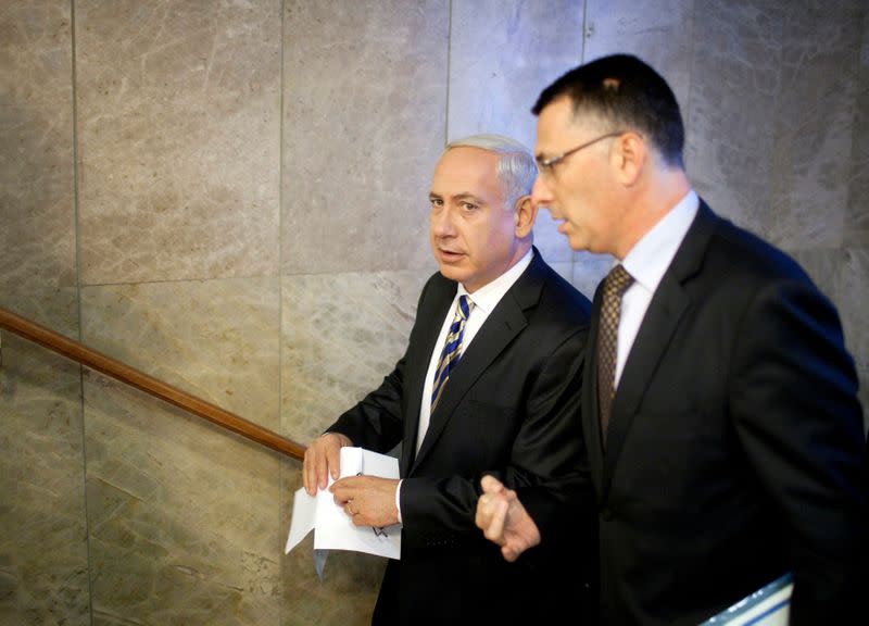 FILE PHOTO: Israel's Prime Minister Benjamin Netanyahu and Education Minister Gideon Saar arrive for the weekly cabinet meeting in Jerusalem