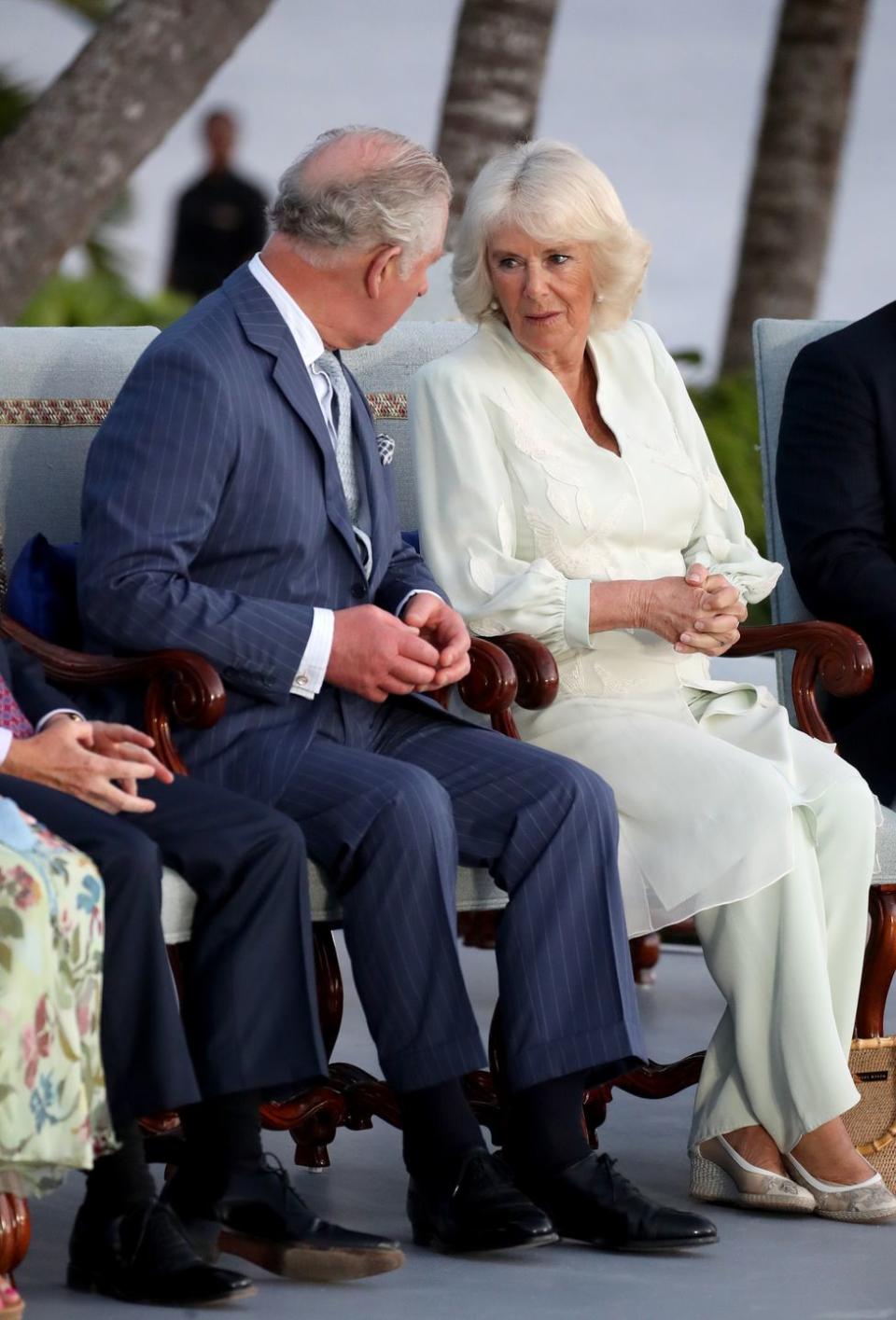 <p>For a celebration at Pedro's Castle in Grand Cayman, the Duchess of Cornwall wore mint green wide leg pants and caftan with a white chiffon overlay. </p>