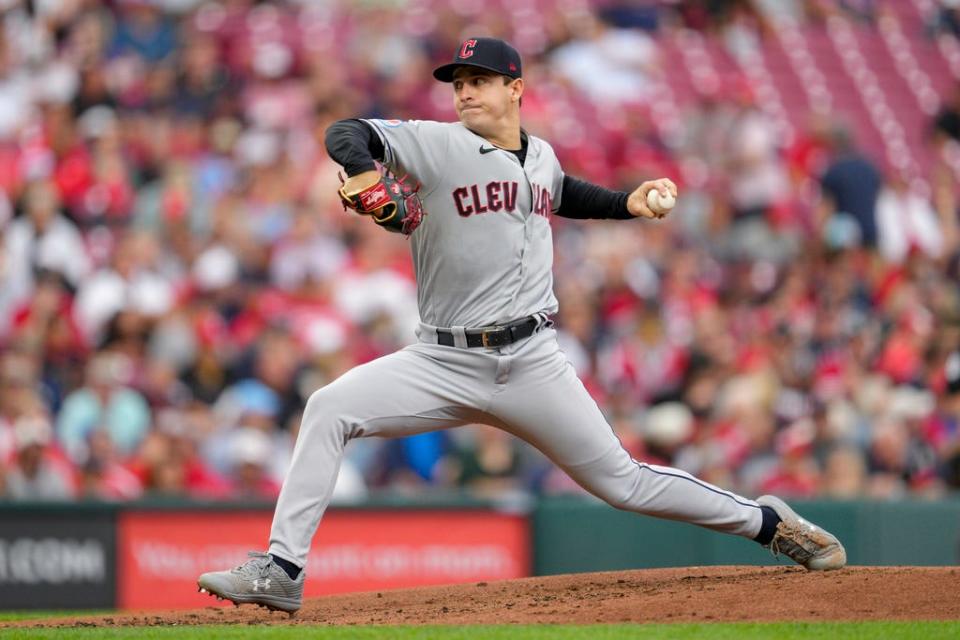 Cleveland Guardians starting pitcher Logan Allen throws against the Cincinnati Reds in the first inning of a baseball game in Cincinnati, Tuesday, Aug. 15, 2023. (AP Photo/Jeff Dean)