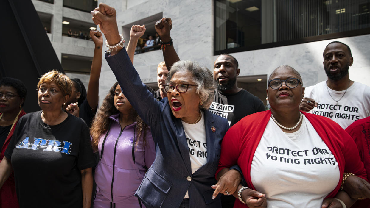 Representative Joyce Beatty, a Democrat from Ohio, center, leads a group of activists through the Hart Senate Office Building during a protest about voting rights on Capitol Hill in Washington, D.C., U.S., on Thursday, July 15, 2021. (Photographer: Al Drago/Bloomberg via Getty Images)