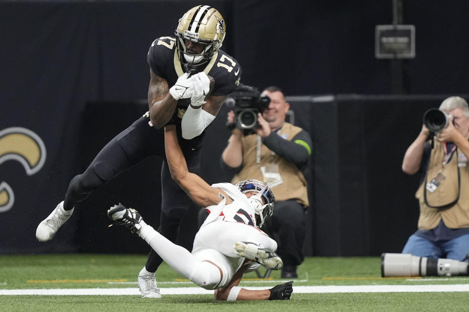 New Orleans Saints wide receiver A.T. Perry (17) scores a touchdown in the first half of an NFL football game against the Atlanta Falcons in New Orleans, Sunday, Jan. 7, 2024. (AP Photo/Gerald Herbert)