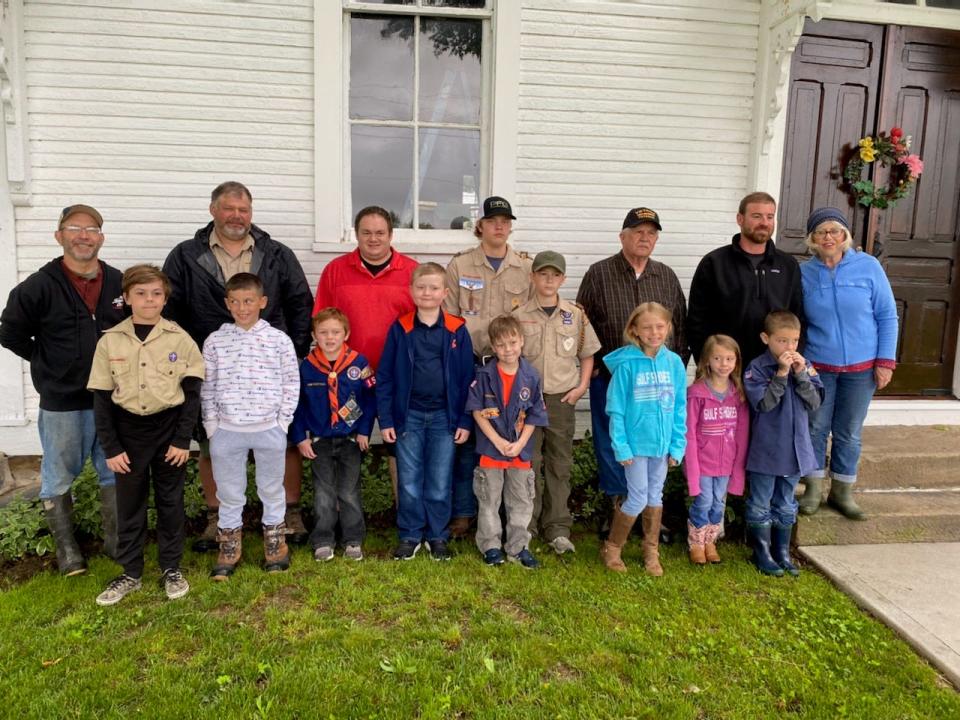 Boy Scout Troup #150 from Minerva joined West Township Memorial Association members in placing 250 flags on veterans graves on Sunday, May 29, 2022, in Moultrie Cemetery and others in the area.
