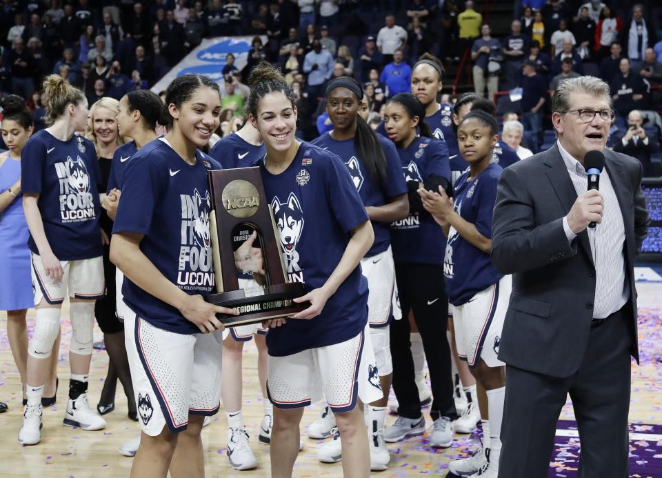 Will Geno Auriemma (right) and the Huskies be hoisting another title on Sunday? (AP)