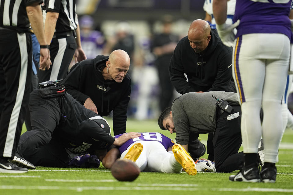 Minnesota Vikings wide receiver Justin Jefferson (18) lays on the field after getting injured during the first half of an NFL football game against the Indianapolis Colts, Saturday, Dec. 17, 2022, in Minneapolis. (AP Photo/Abbie Parr)