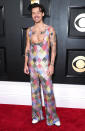 <p>Ever the red carpet risk taker, the "As It Was" singer flaunted his tats and lean arms in this <a href="https://people.com/style/grammys-2023-harry-styles-rainbow-jumpsuit-red-carpet-photos/" rel="nofollow noopener" target="_blank" data-ylk="slk:rainbow patchwork Egonlab jumpsuit;elm:context_link;itc:0;sec:content-canvas" class="link ">rainbow patchwork Egonlab jumpsuit</a> covered in Swarovski crystals.</p>